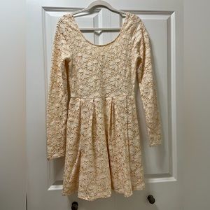 Free People long sleeved,size medium light peach & cream soft lace lined dress
